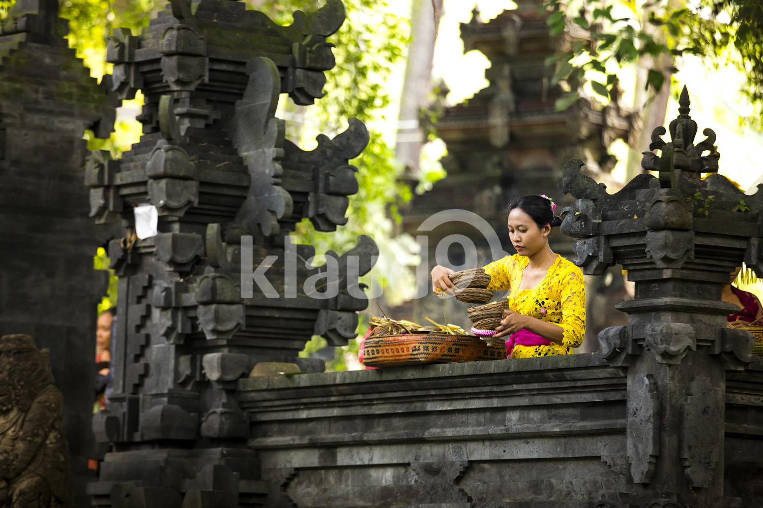 Balinese woman with offerings