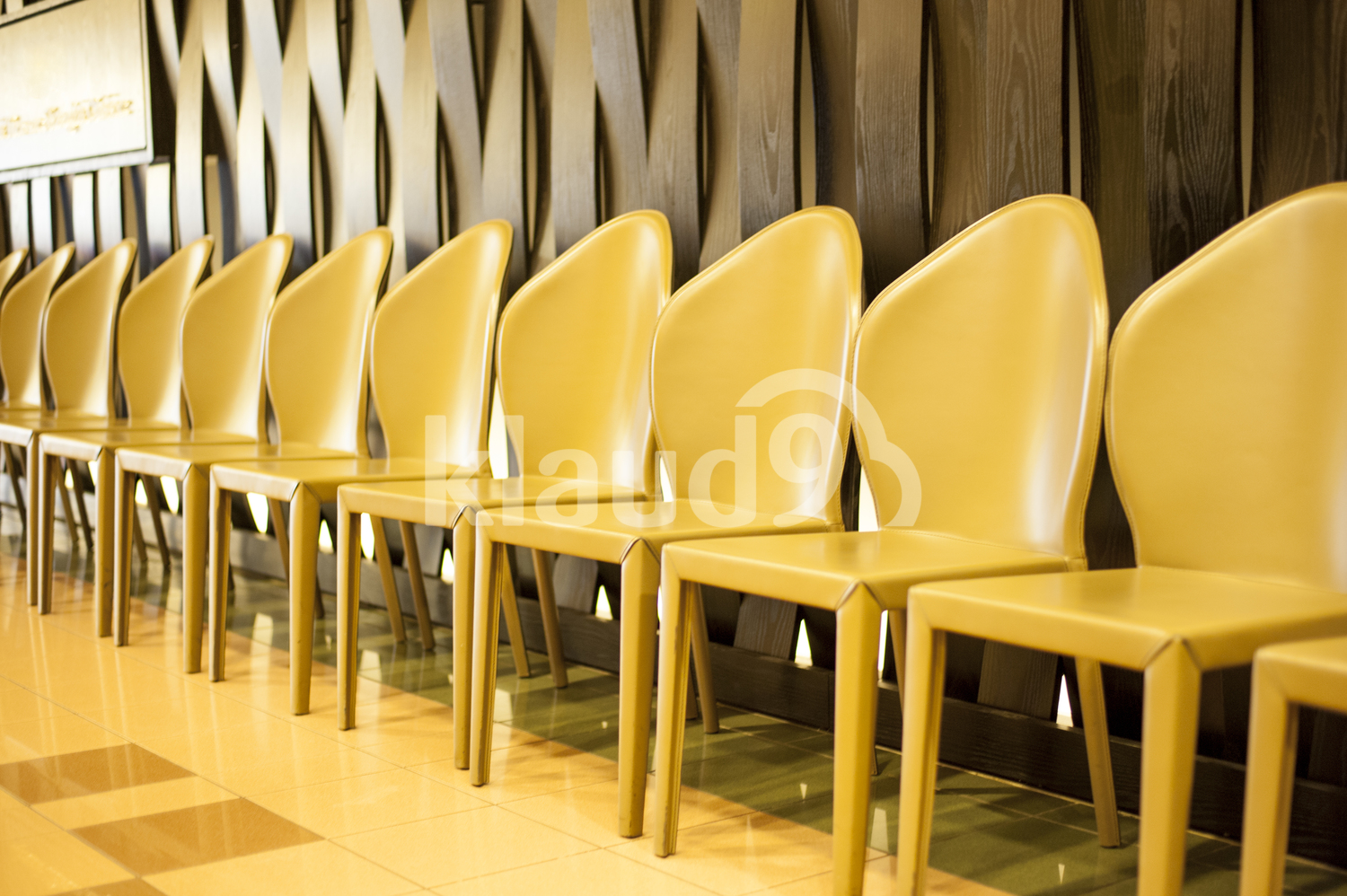 Yellow chairs in a row.