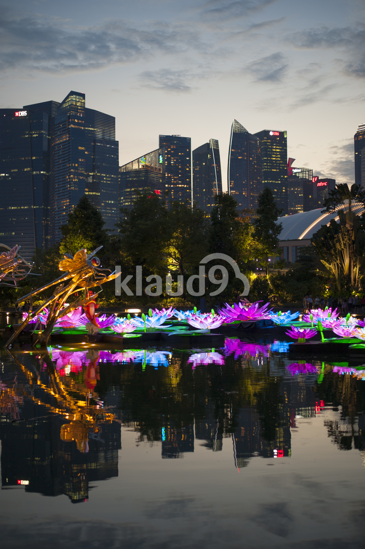 Lantern displays against cityscape background