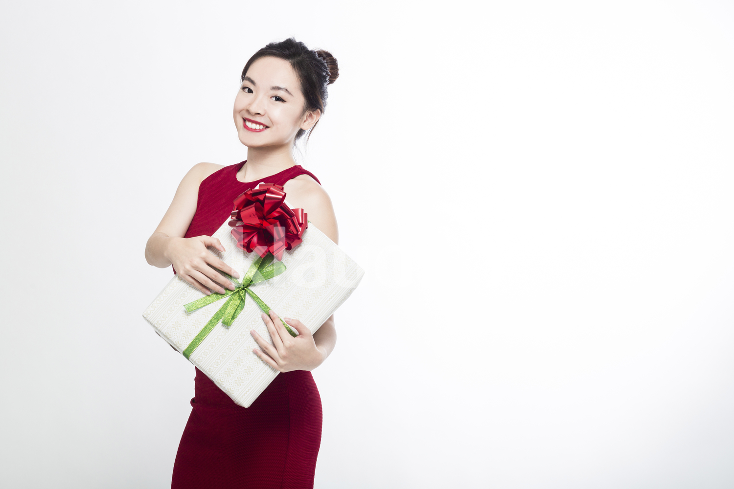Pretty woman with a big gift box