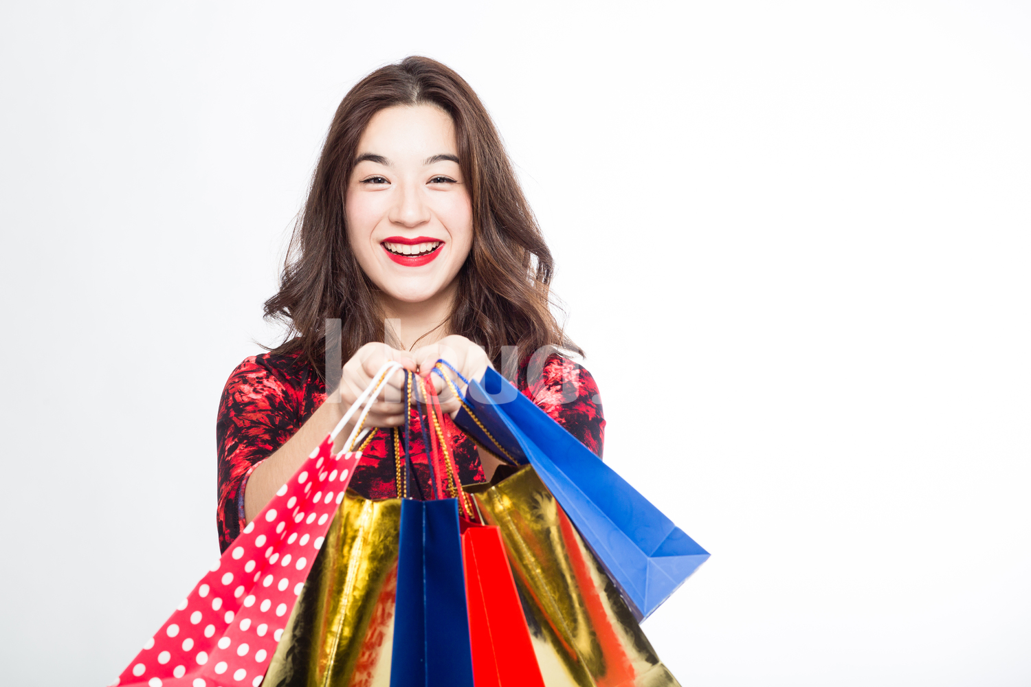 Happy Woman with Shopping Bags