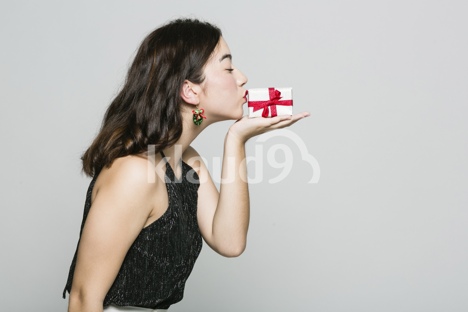 Pretty Woman Kissing a Box