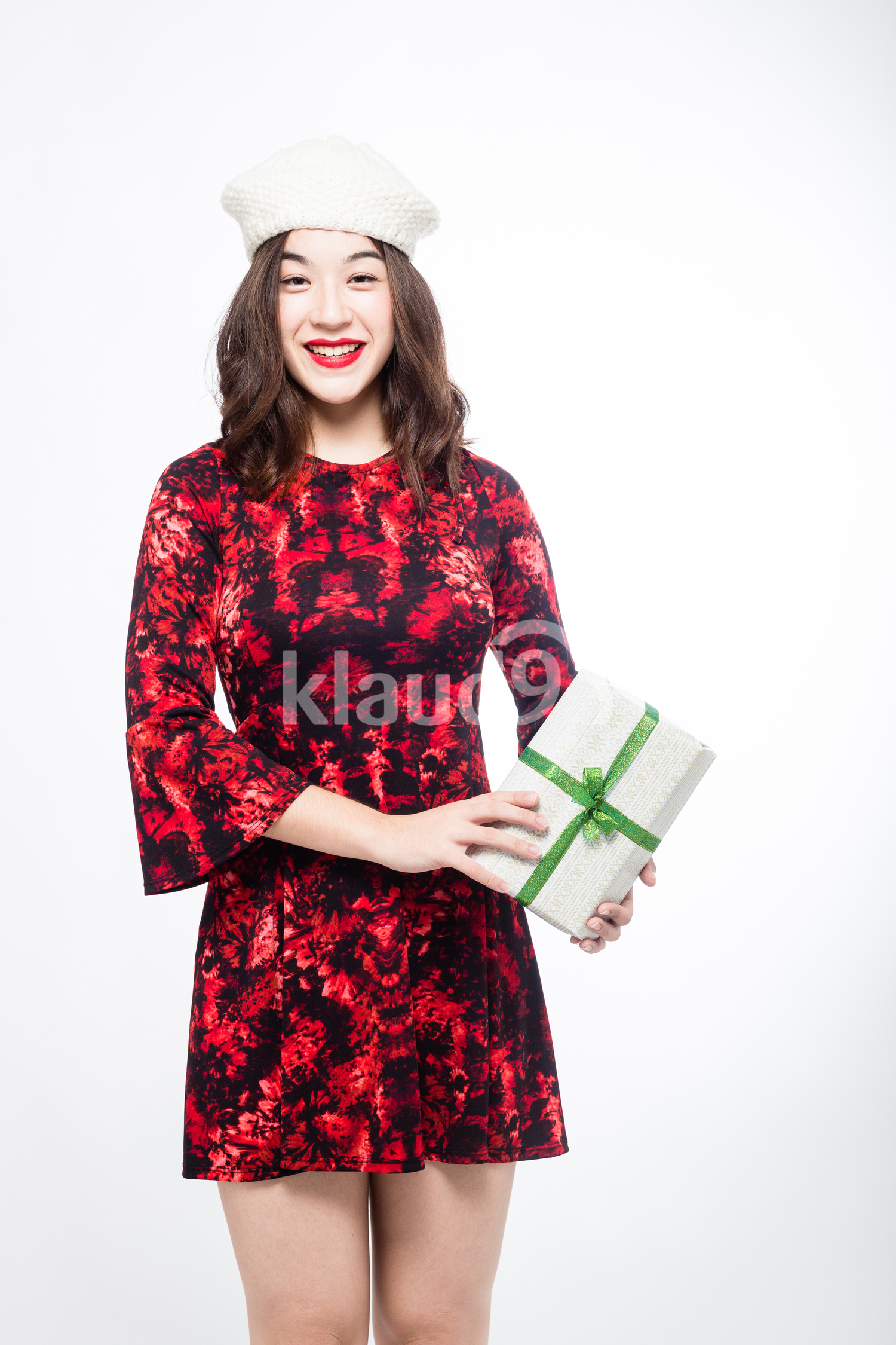 Eurasian Woman with her Christmas Present