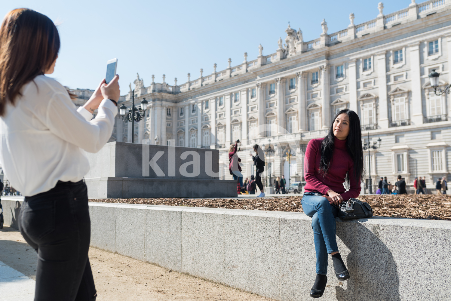 Asian women taking photos