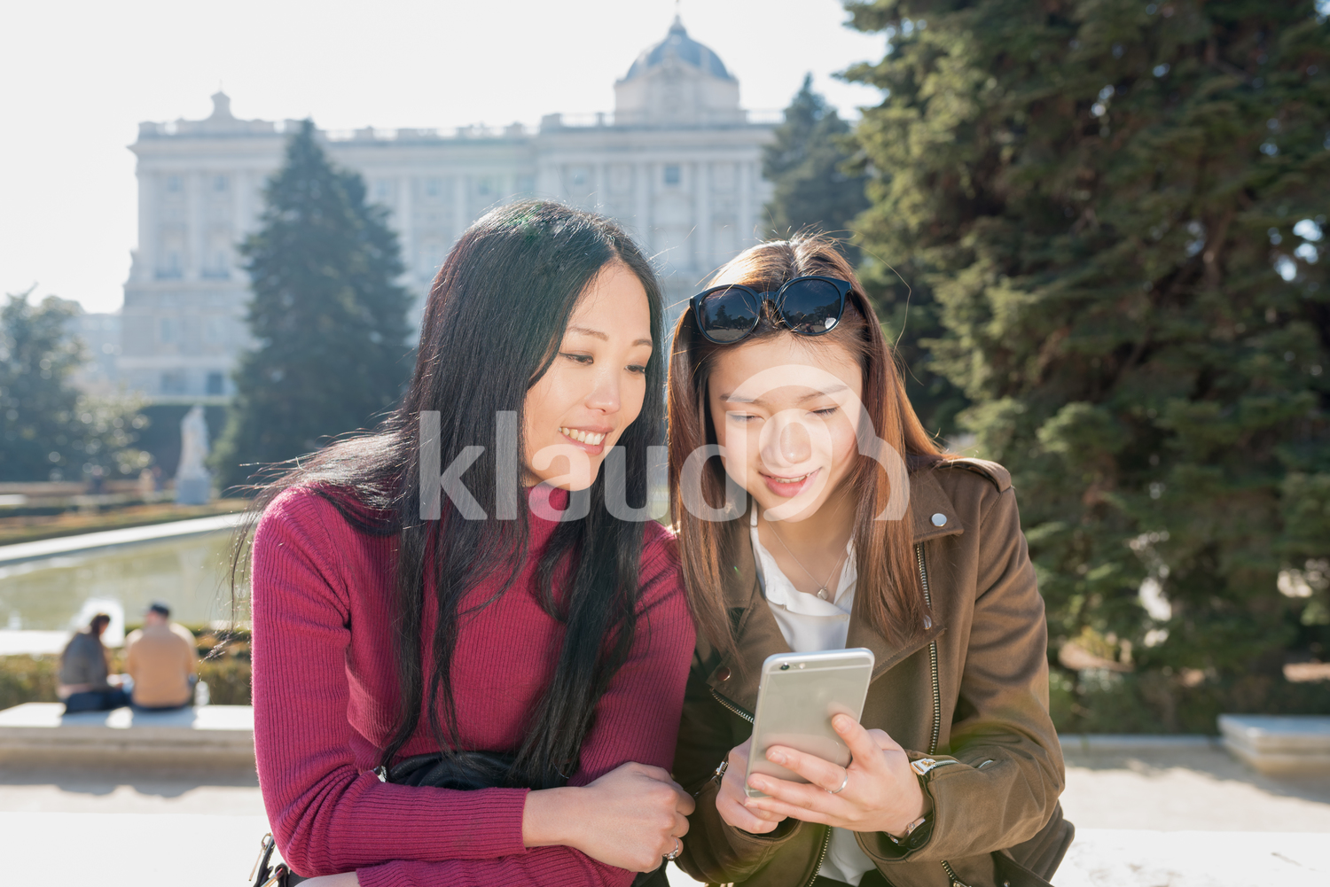Long hair Asian women with their camera phone