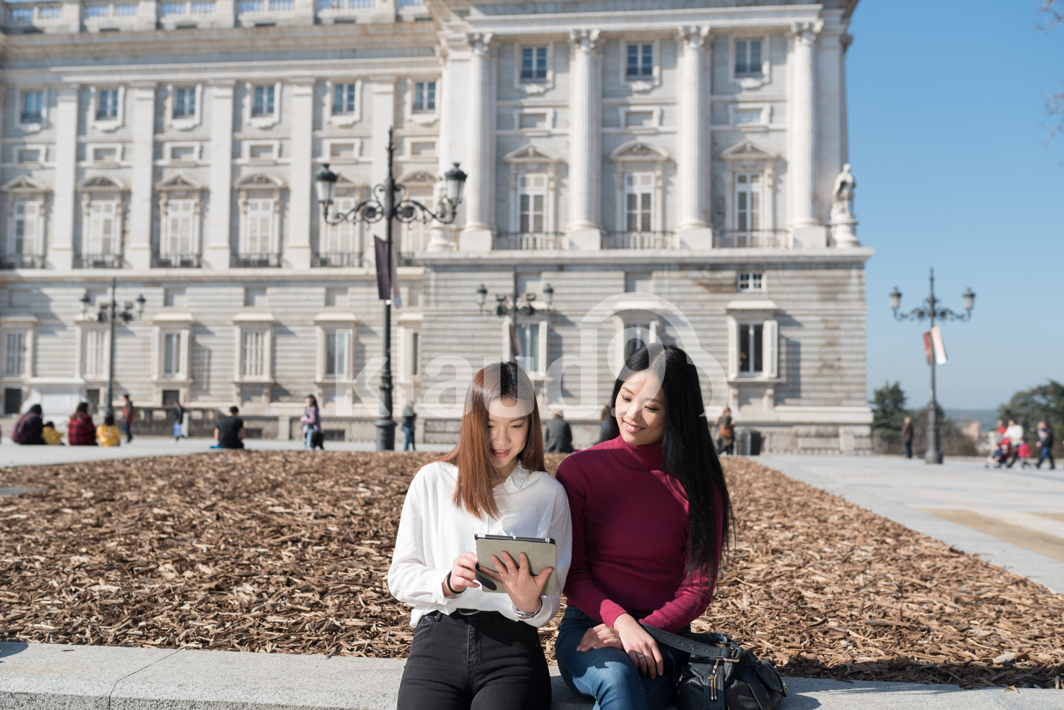 Asian women browsing her tablet