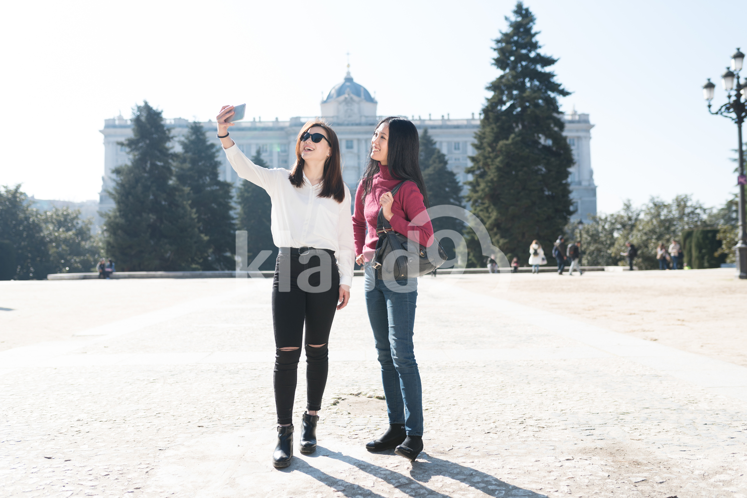Happy Asian women taking a selfie