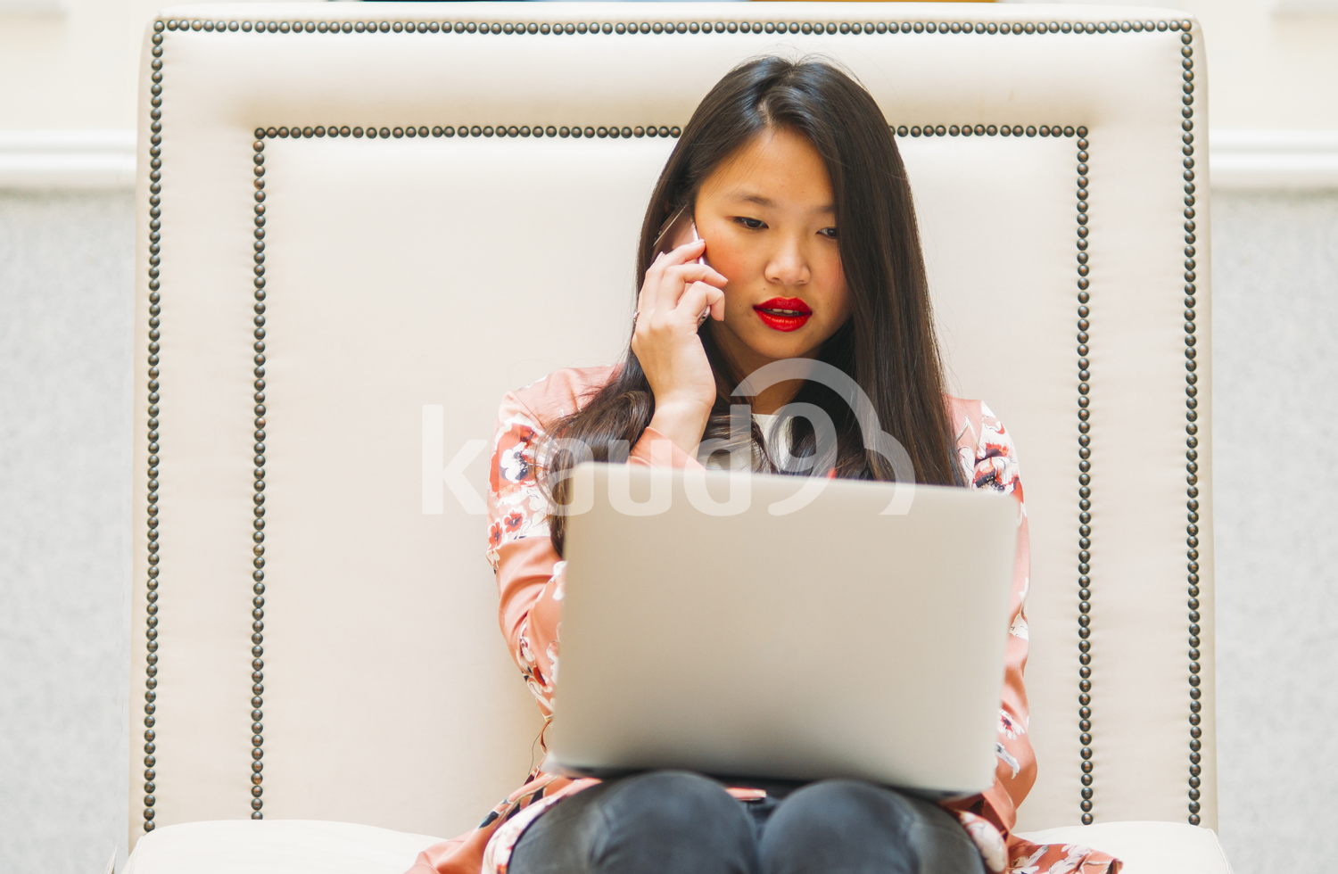 Chinese woman working on her laptop