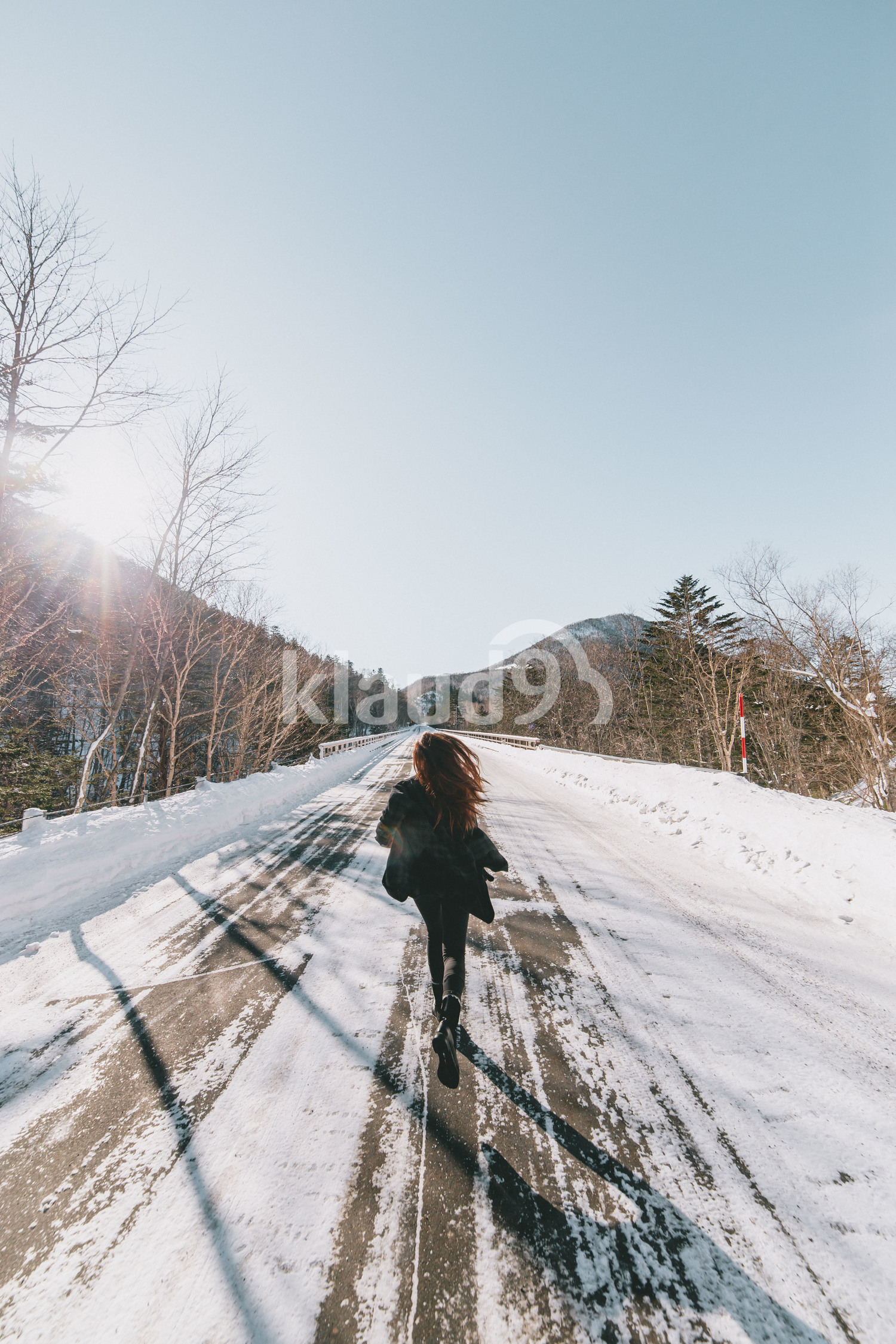 Back view of an asian woman running