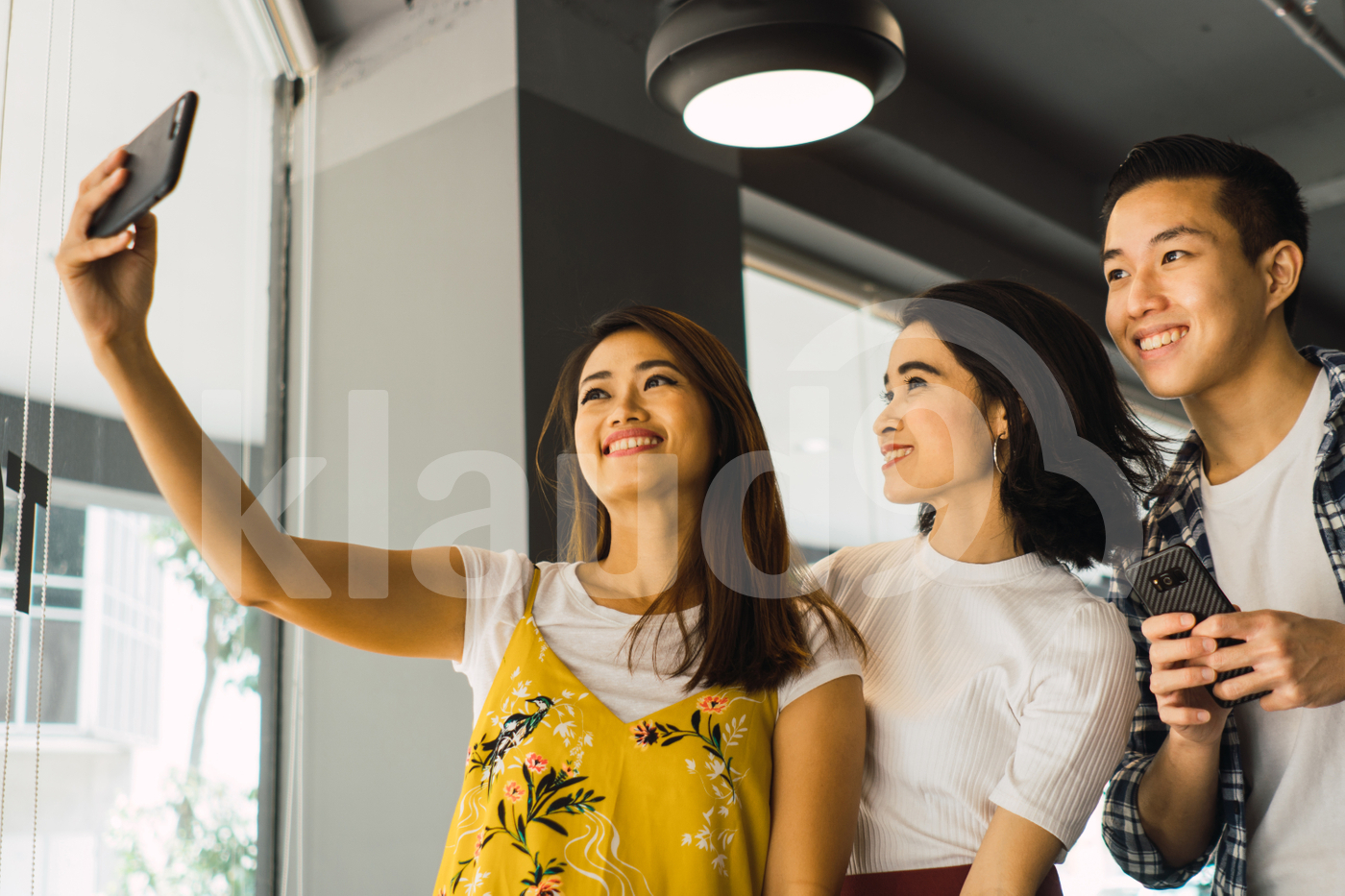Asian millennials taking selfie