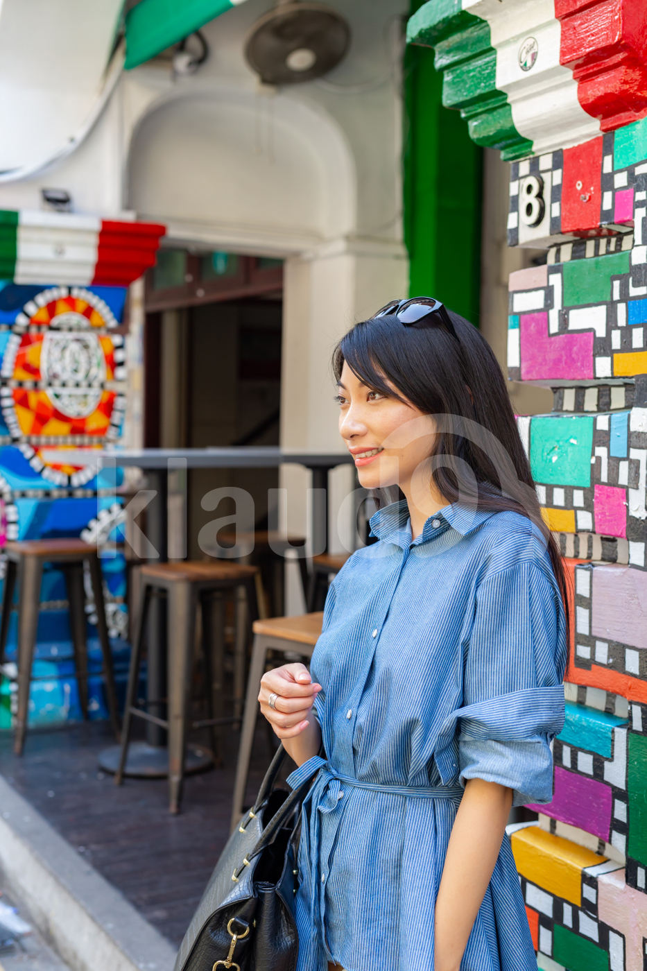 Young Asian woman standing outdoors