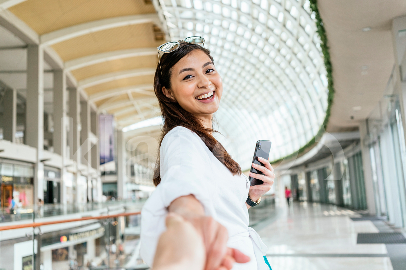 Smiling Asian woman  looking at the camera