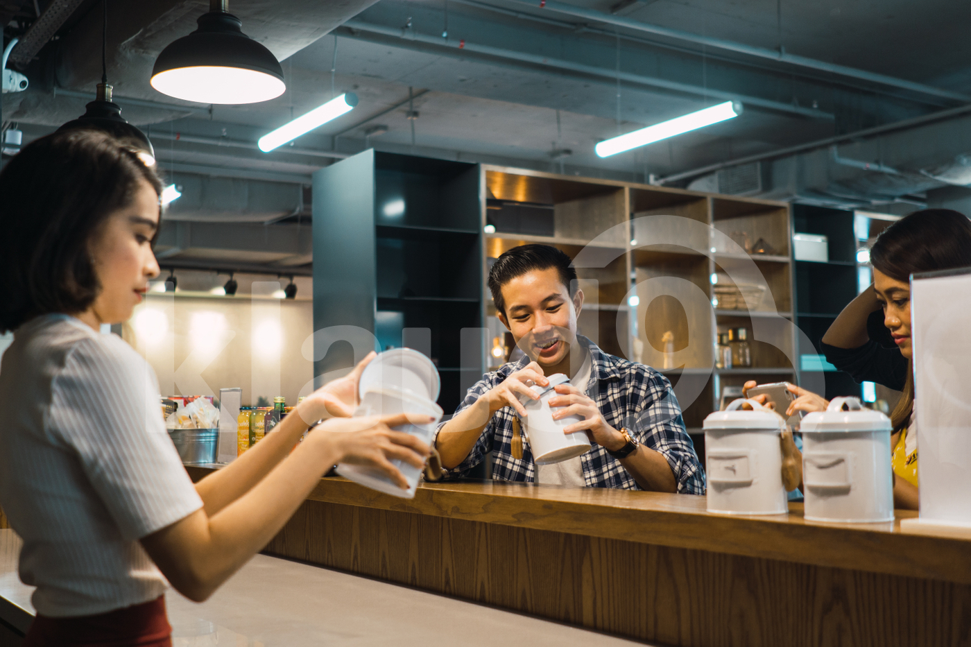 Asian woman working in a co-working space