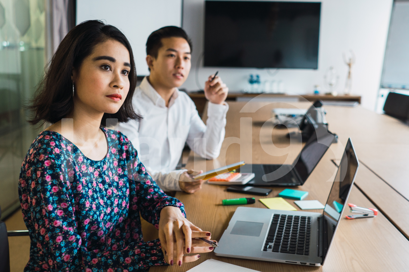 Asian millennials working in a co-working space