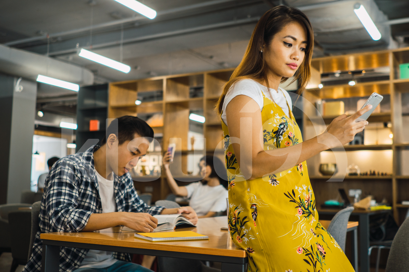 Asian millennials working in a co-working space