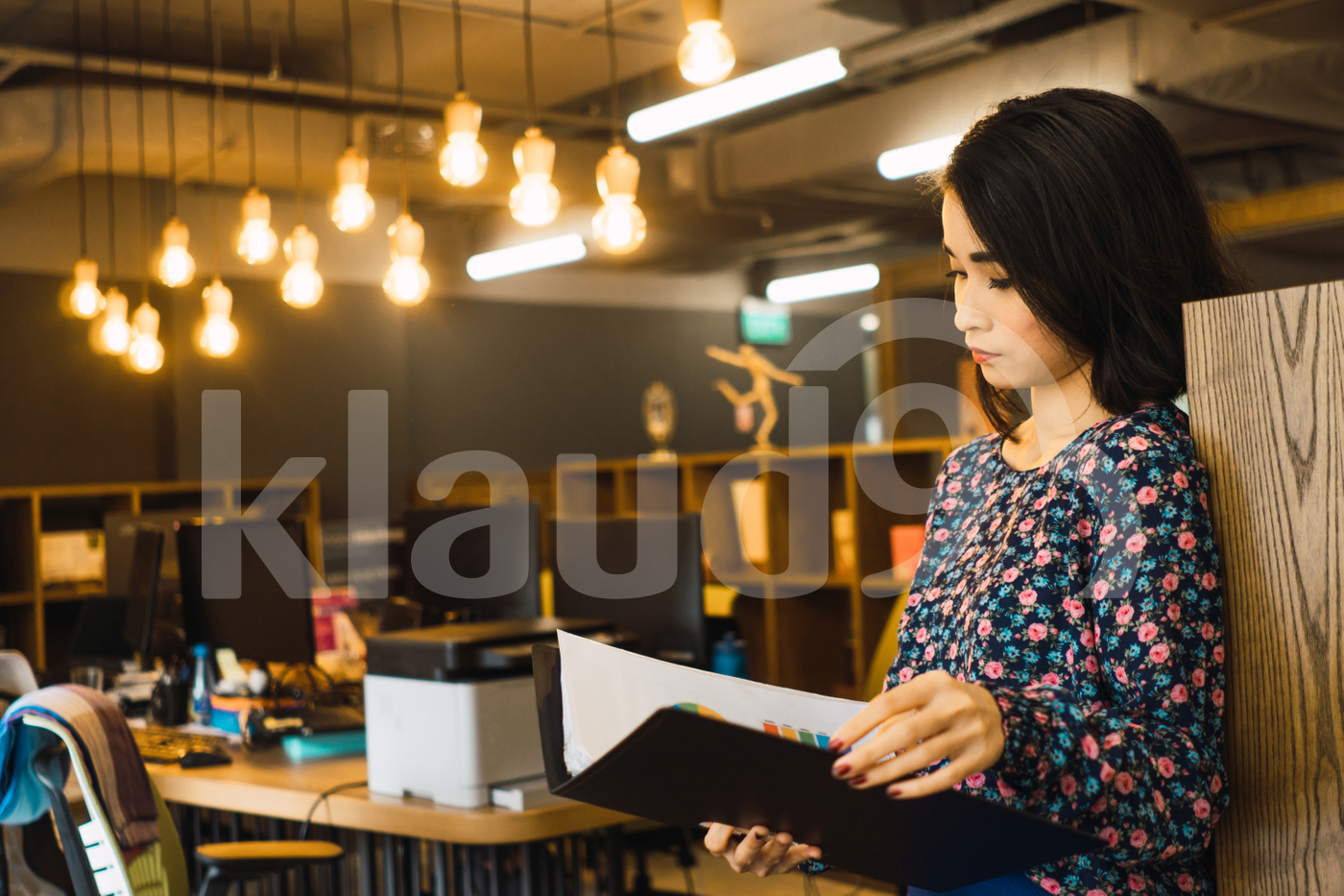Asian woman standing in the office