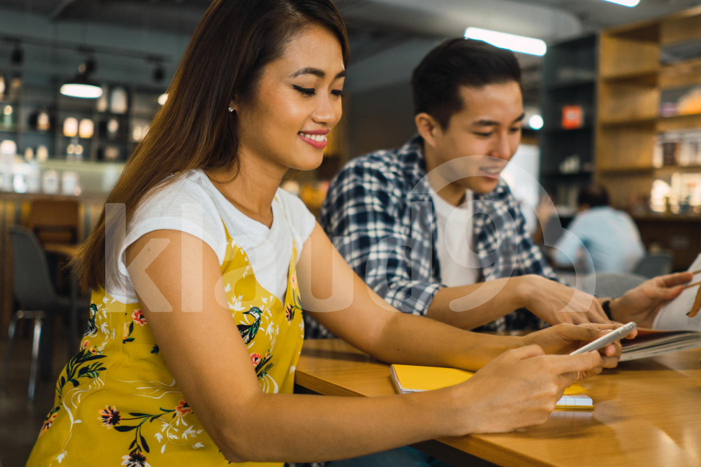Asian millennials working in a co-working space