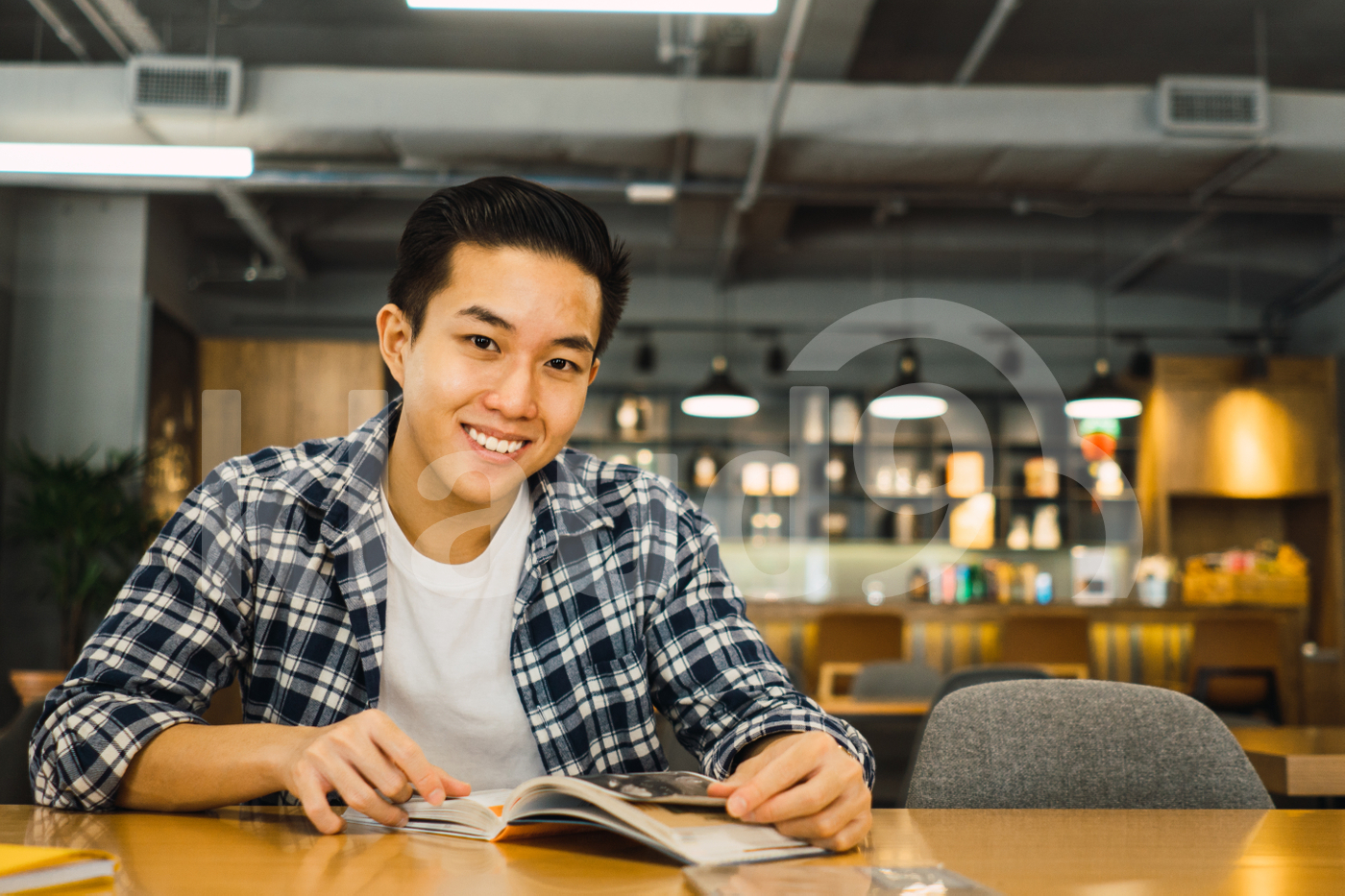 Asian man working in a co-working space