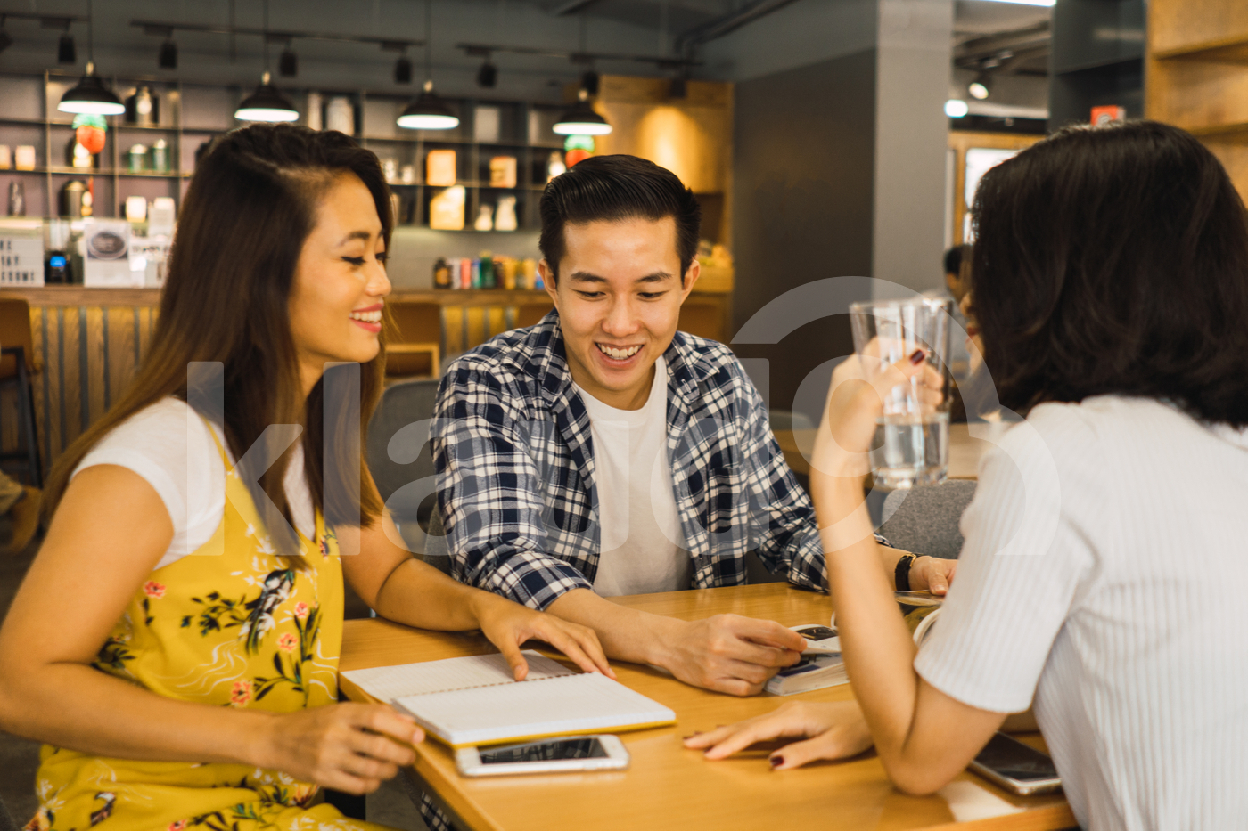 Asian millennials working in a co-working space